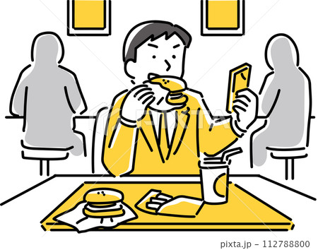 食事をしながらスマホを見ているビジネスマン 112788800