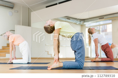 School girl training stretching workout School girl training stretching workout 112789310