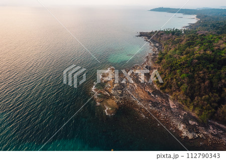 Beach and sea in the evening, high angle view Beach and sea in the evening, high angle view 112790343