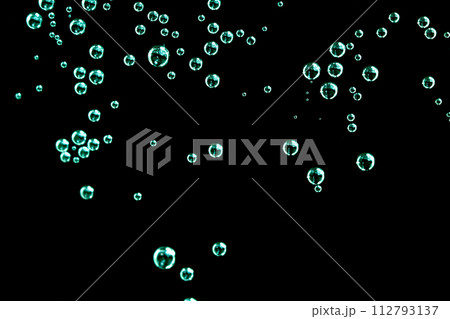 clear bubbles of soda on black background clear bubbles of soda on black background 112793137