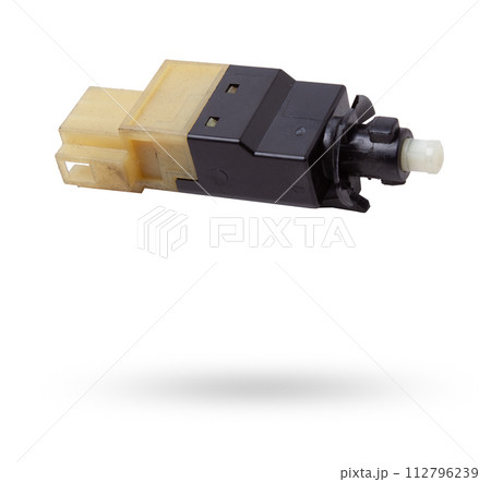 brake light switch under the brake pedal in a car on a white isolated background. catalog of spare parts for websites and advertising. 112796239