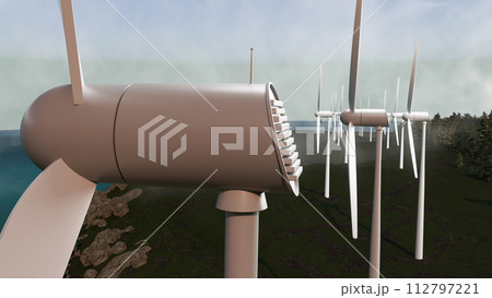 A wind farm with several wind turbines in the background 112797221