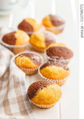 Close Up of a Muffin on a white Table 112798771