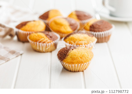 Close Up of a Muffin on a white Table 112798772