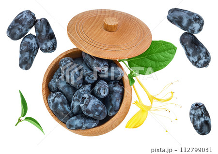 Fresh honeysuckle blue berry in wooden bowl isolated on white background with full depth of field. Top view. Flat lay 112799031