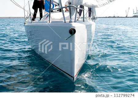 Front close-up view of a yacht bow Front close-up view of a yacht bow 112799274