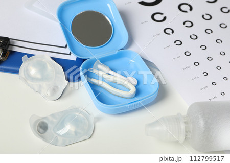 Contact lenses with accessories and a sight test plate Contact lenses with accessories and a sight test plate 112799517