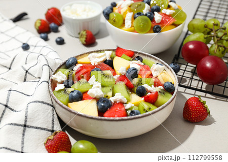 Healthy food and healthy nutrition concept - fruit salad 112799558