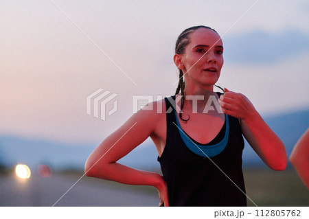 Close-Up Portrait of Determined Athlete Resting After Intense Workout Close-Up Portrait of Determined Athlete Resting After Intense Workout 112805762
