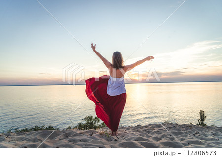 Woman staying at the sea Woman staying at the sea 112806573