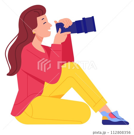 Woman shooting with photo camera. Professional female photographer 112808356
