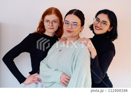 Sisters United: A Portrait of Family Love and Bonding on White Background Sisters United: A Portrait of Family Love and Bonding on White Background 112808386