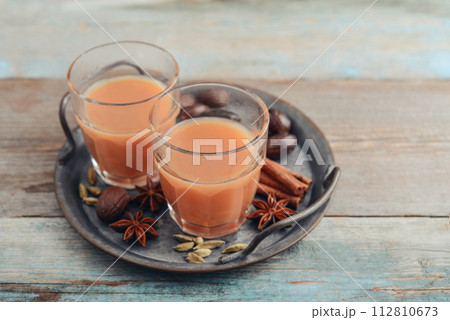 Traditional indian drink - masala tea Traditional indian drink - masala tea 112810673