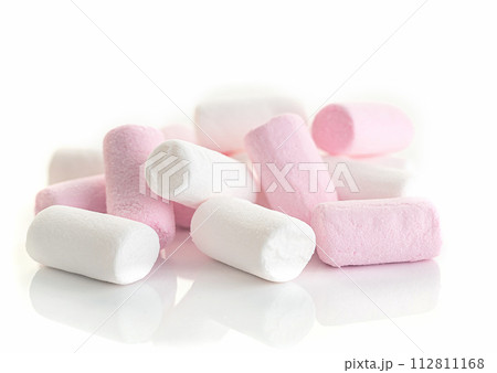 Heap of white and pink puffy marshmallow on white background. Heap of white and pink puffy marshmallow on white background. 112811168