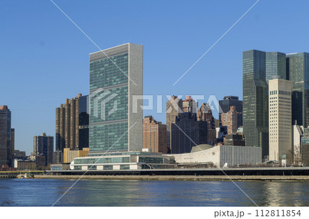 United Nations Building View on a Clear Blue day, Midtown Manhattan skyline, New York City United Nations Building View on a Clear Blue day, Midtown Manhattan skyline, New York City 112811854