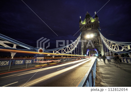 Tower Bridge and traffic light at twilight in London Tower Bridge and traffic light at twilight in London 112812054