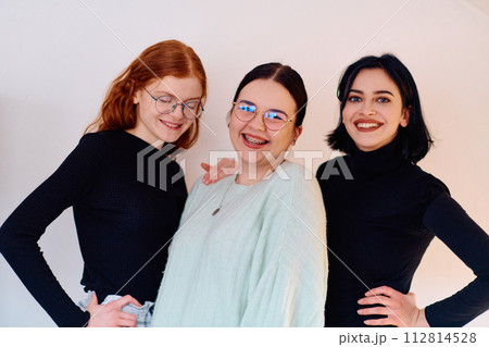 Sisters United: A Portrait of Family Love and Bonding on White Background Sisters United: A Portrait of Family Love and Bonding on White Background 112814528