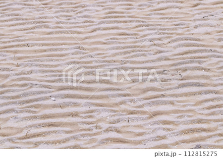 Abstract Texture background. Brown sand beach wavy wet. Wavy sand background for summer designs. Abstract Texture background. Brown sand beach wavy wet. Wavy sand background for summer designs. 112815275