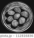 Minimal vector illustration of striped black and white linocut eggs on a plate 112816836