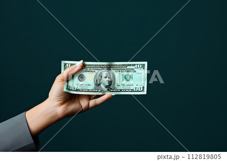 AI-generated content. hand holding one hundred dollar 112819805