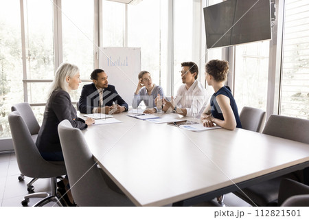 Five diverse office employee listen to male boss make speech 112821501