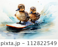 Two ducklings in a surfboard on the background of the waves 112822549