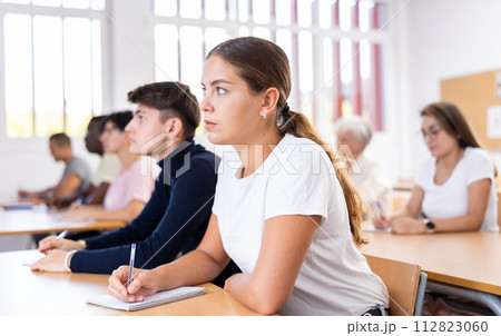 Attentive university students in advanced training courses in auditorium 112823060