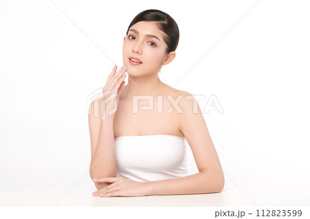 Beautiful young asian woman with clean fresh skin on white background, Face care, Facial treatment, Cosmetology, beauty and spa, Asian women portrait. Beautiful young asian woman with clean fresh skin on white background, Face care, Facial treatment, Cosmetology, beauty and spa, Asian women portrait. 112823599