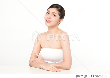 Beautiful young asian woman with clean fresh skin on white background, Face care, Facial treatment, Cosmetology, beauty and spa, Asian women portrait. Beautiful young asian woman with clean fresh skin on white background, Face care, Facial treatment, Cosmetology, beauty and spa, Asian women portrait. 112823600