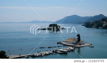 Monastery on the water, over which planes take off and land Greece Corfu island Vlacherna Monastery Monastery on the water, over which planes take off and land Greece Corfu island Vlacherna Monastery 112823735
