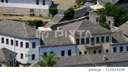 City of Gjirokaster in Southern Albania. Old Town is a UNESCO World Heritage Site. Closeup of Architectural Buildings. City of Gjirokaster in Southern Albania. Old Town is a UNESCO World Heritage Site. Closeup of Architectural Buildings. 112824200