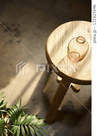 Comfortable rest by the sunny window. A background with sunlight and shadows that can be used in various designs. 112825046