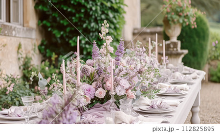 Wedding decor with lavender theme, floral decoration design and beautiful decor setting arrangement 112825895