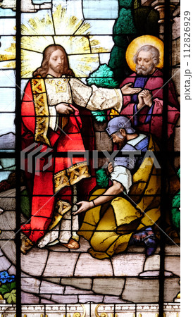 Jesus and the centurion. Lord, I am not worthy to have you come under my roof..., stained glass window in the Basilica of the Sacred Heart of Jesus in Zagreb, Croatia 112826929