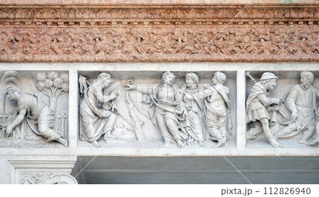 Mary Magdalene points out Redeemer by Zaccaria da Volterra, door of San Petronio Basilica in Bologna, Italy 112826940