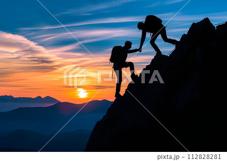 Silhouette of couple hiking help each other silhouette in mountains with sunlight 112828281