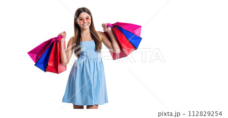 teen girl at shopping on background, copy space. photo of teen girl at shopping with bags 112829254