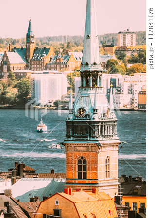 Stockholm, Sweden. Scenic View Of Skyline At Summer Day. Elevated View Of German St Gertrude's Church. Famous Popular Destination Stockholm, Sweden. Scenic View Of Skyline At Summer Day. Elevated View Of German St Gertrude's Church. Famous Popular Destination 112831176