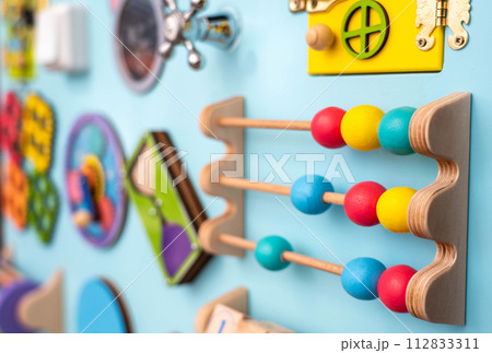 Close -up wooden panel for children's development Close -up wooden panel for children's development 112833311