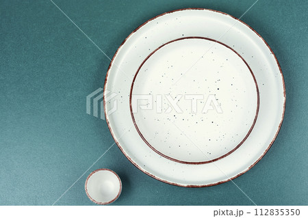 Empty plates on the table Empty plates on the table 112835350