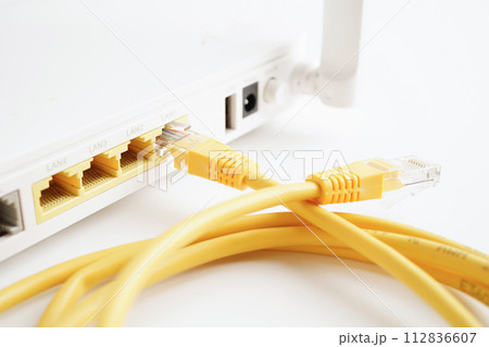 Ethernet cable with wireless router connect to internet service provider network. Ethernet cable with wireless router connect to internet service provider network. 112836607
