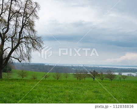 Romanshorn, Switzerland - April 8th 2023: View towards the city surrounded by Lake Constance. 112838816
