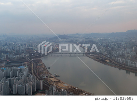 Aerial view of Seoul Downtown Skyline, South Korea. Financial district and business centers in smart urban city in Asia. Skyscraper and high-rise buildings. 112839695