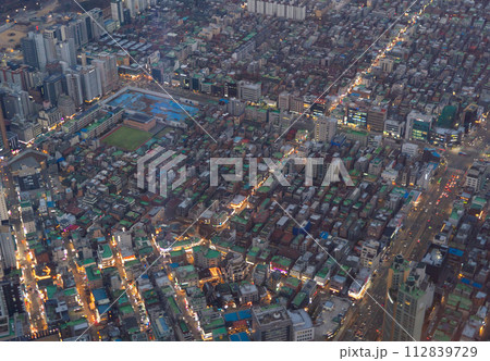 Aerial view of Seoul Downtown Skyline, South Korea. Financial district and business centers in smart urban city in Asia. Skyscraper and high-rise buildings. Aerial view of Seoul Downtown Skyline, South Korea. Financial district and business centers in smart urban city in Asia. Skyscraper and high-rise buildings. 112839729