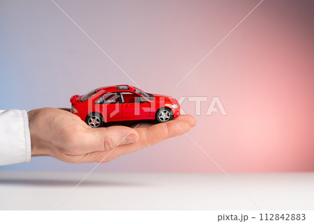 concept : car insurance red car accident in hand concept : car insurance red car accident in hand 112842883