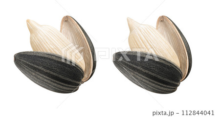 Set of open sunflower seeds isolated on white background 112844041