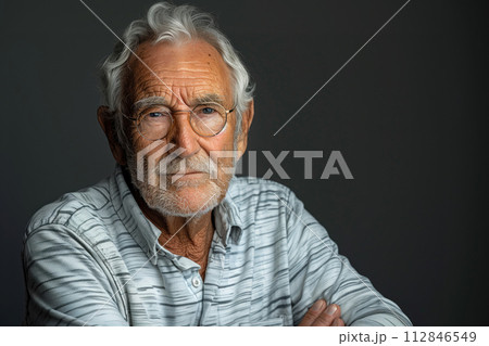 portrait of smiling senior man in eyeglasses on a blurred background portrait of smiling senior man in eyeglasses on a blurred background 112846549