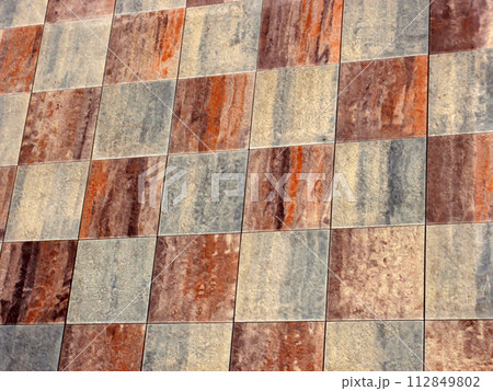 Checked Ceramic rustic tiled floor Checked Ceramic rustic tiled floor 112849802