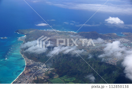 Aerial view of Waimanalo, Rock Island, Hawaii Kai Town, Koko Head Crater, farms, ko'olau range mountains, Kuapa Pond, Hanauma Bay, clouds and Pacific Ocean Aerial view of Waimanalo, Rock Island, Hawaii Kai Town, Koko Head Crater, farms, ko'olau range mountains, Kuapa Pond, Hanauma Bay, clouds and Pacific Ocean 112850138