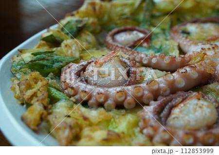 Korean-style pancakes with whole octopus and green onion 112853999